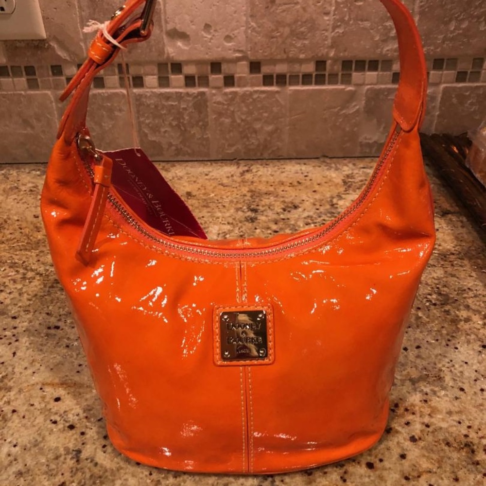 NWT, Dooney & Bourke Orange Patent Bucket Bag